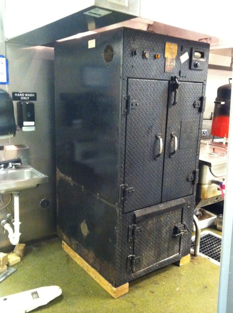 4,000 pound smoker in place in new restaurant