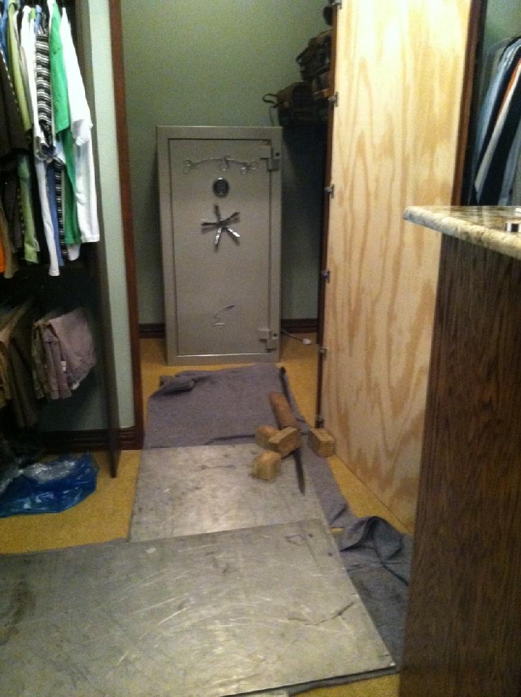 Amsec gun safe in place in a closet