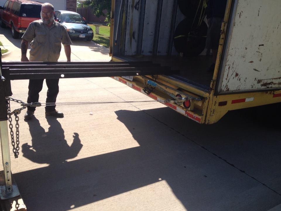 our safe moving trailer ramps sitting on the bak of the tractor trailer