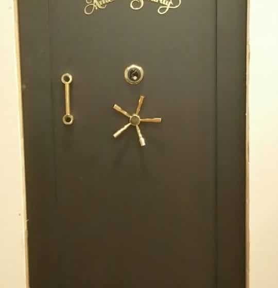 safe move e 540x560 - Here is an American Security vault door we delivered and installed in a house